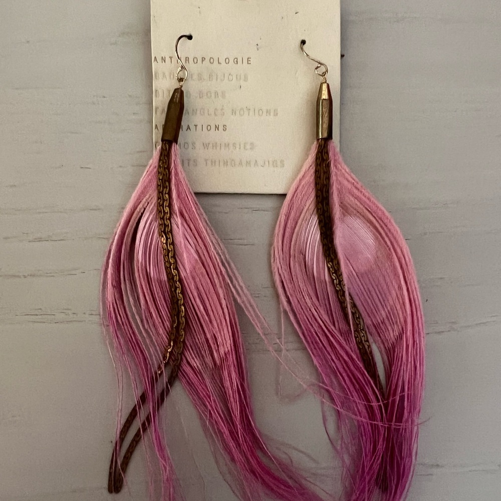 Brand new, never worn pink feather earrings with gold chains